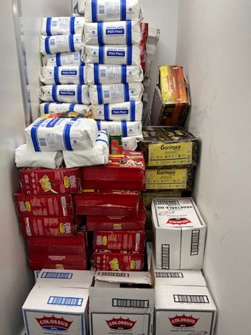 Pallets of flour, rice, pasta and cooking oil stored for SWDA emergency food relief