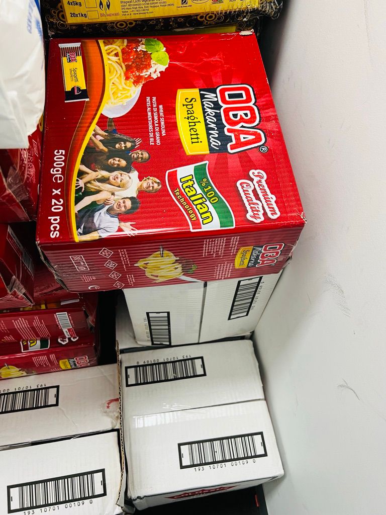 Boxes of pasta and staple food items packed for SWDA emergency food relief deliveries